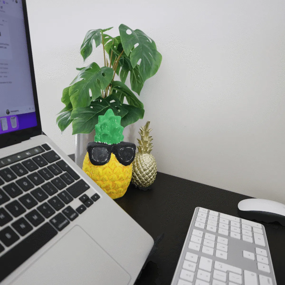 Laptop and pineapples